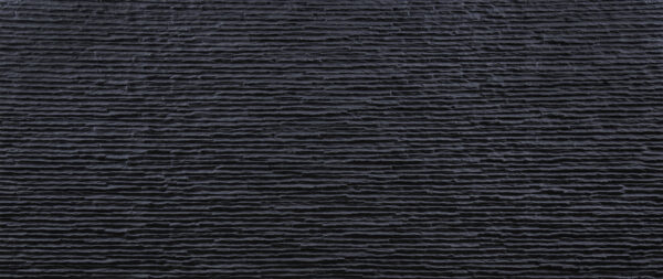 Coraggioso black concrete wall panel with industrial texture showing deep charcoal finish for dramatic modern interior wall cladding