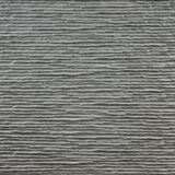 Coraggioso flexible concrete wall panel in Fumo gray color showing modern industrial texture and authentic cement finish for contemporary interior design